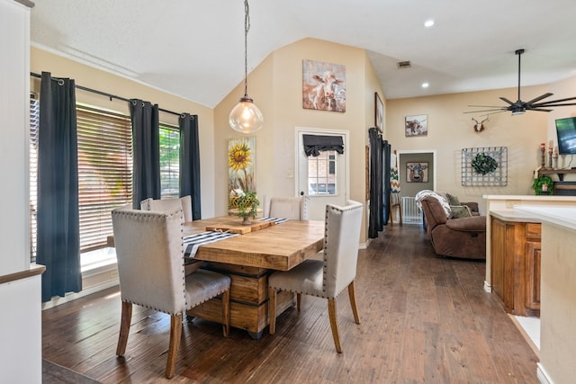 dining space featuring visible vents, vaulted ceiling, hardwood / wood-style floors, recessed lighting, and a ceiling fan