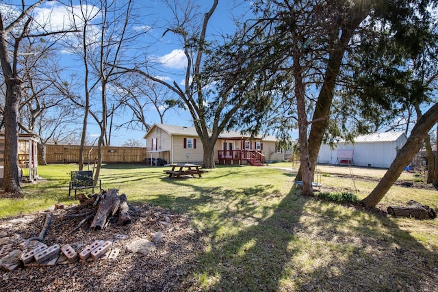 view of yard featuring a wooden deck