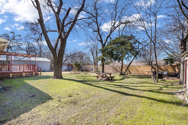 view of yard featuring a deck