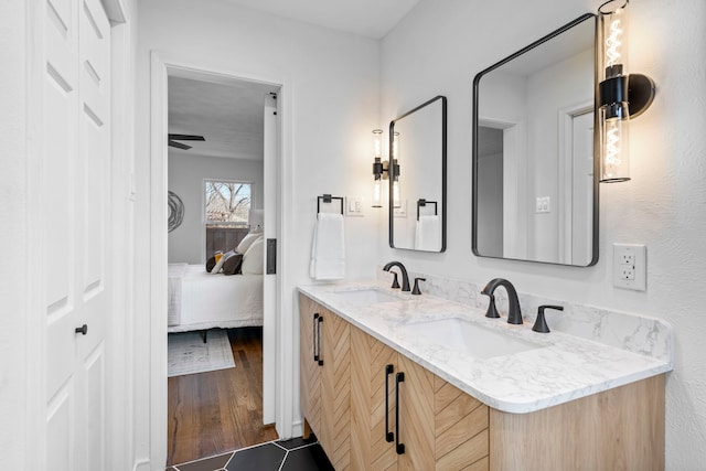 bathroom featuring tile patterned floors and vanity