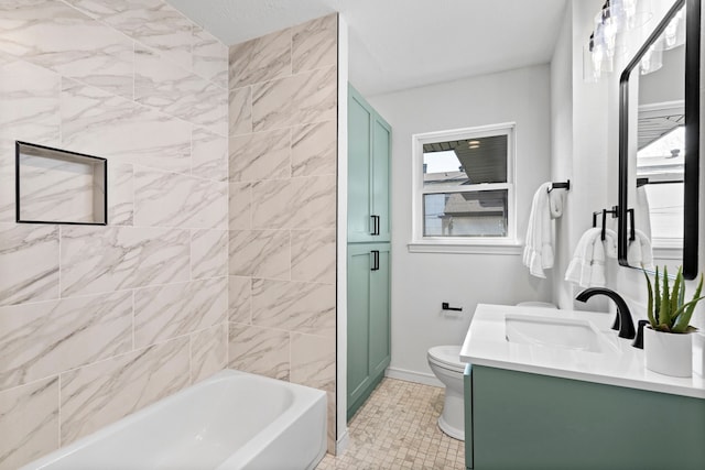 bathroom with tile patterned flooring, vanity, and toilet