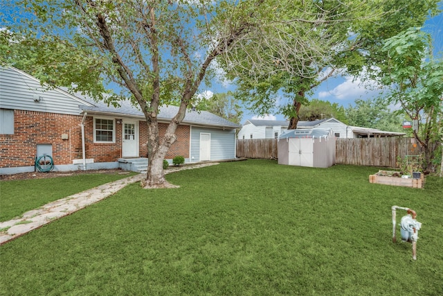 view of yard with a storage shed