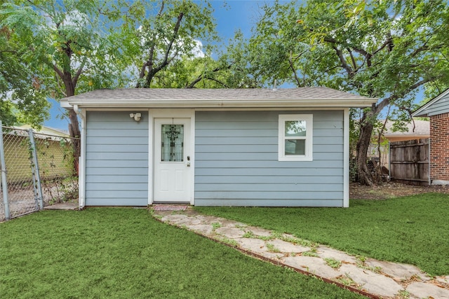 view of outdoor structure featuring a yard