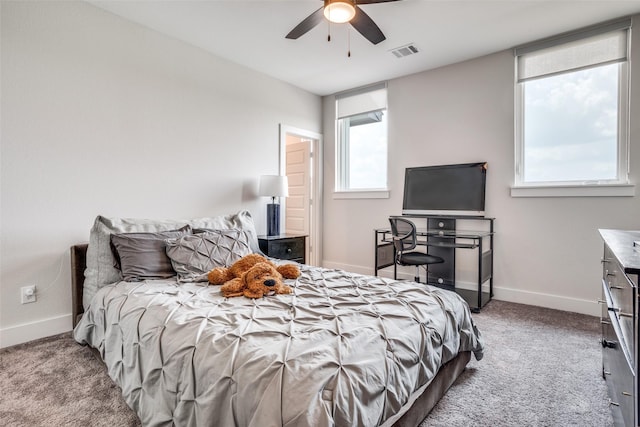 carpeted bedroom featuring ceiling fan