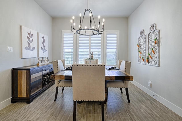 dining area featuring a chandelier