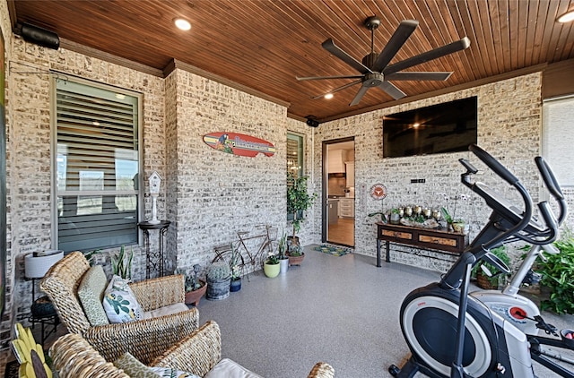 exterior space with ceiling fan