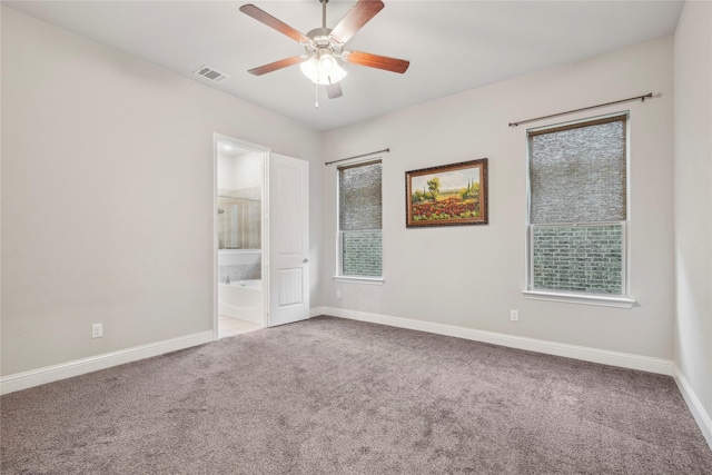 spare room with ceiling fan and carpet floors