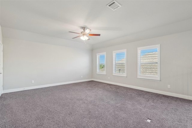 carpeted empty room with ceiling fan