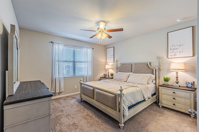 bedroom with ceiling fan and light carpet