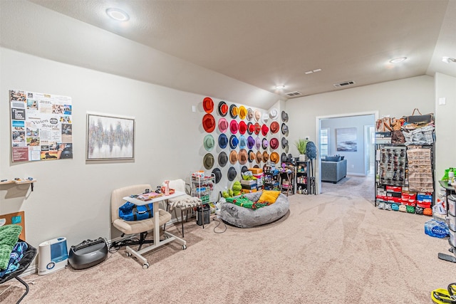 game room featuring lofted ceiling and carpet floors