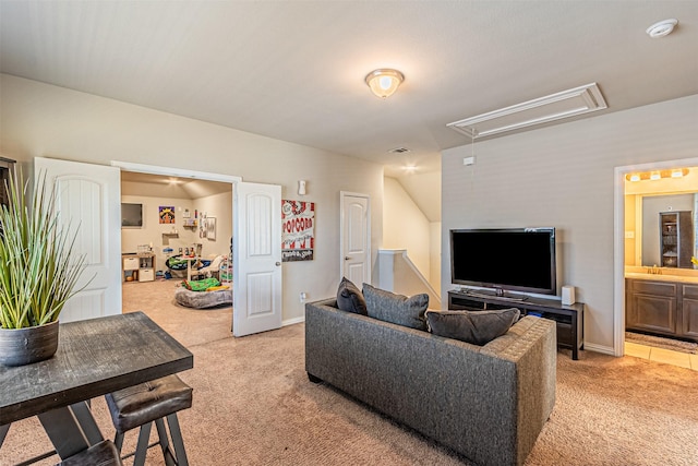 living room featuring lofted ceiling, sink, and light carpet