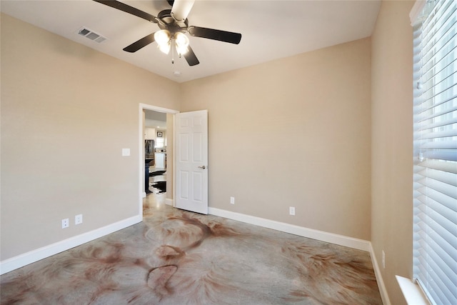 spare room featuring ceiling fan