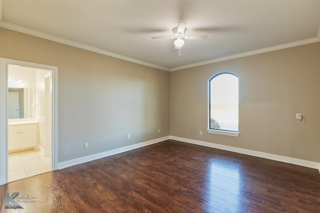 empty room with wood-type flooring, ornamental molding, and ceiling fan