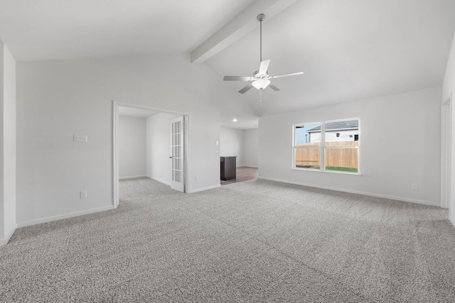 unfurnished living room featuring high vaulted ceiling, beam ceiling, light colored carpet, and ceiling fan