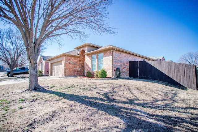 view of property exterior with a garage