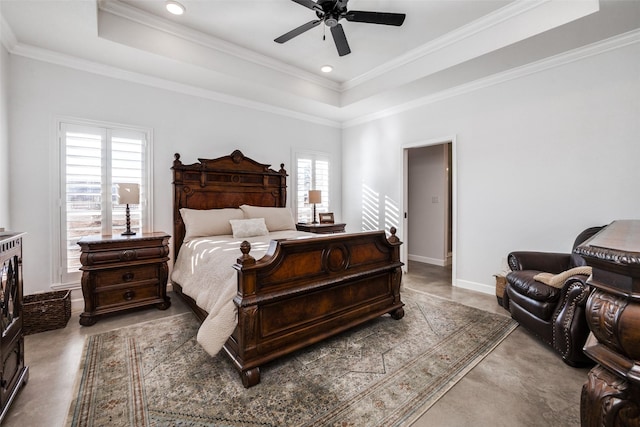 bedroom with a raised ceiling, crown molding, and ceiling fan