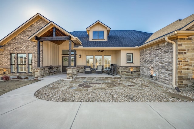 back of property with a patio area and ceiling fan