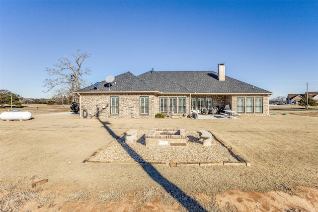 back of property featuring a patio area