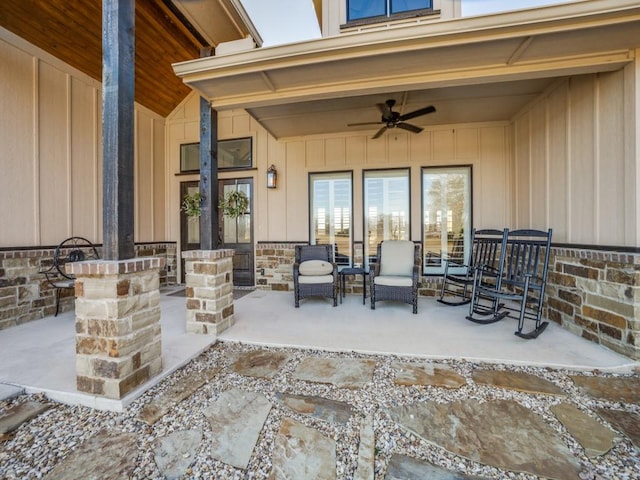 view of patio featuring ceiling fan