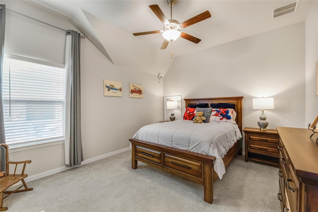 carpeted bedroom featuring ceiling fan and lofted ceiling