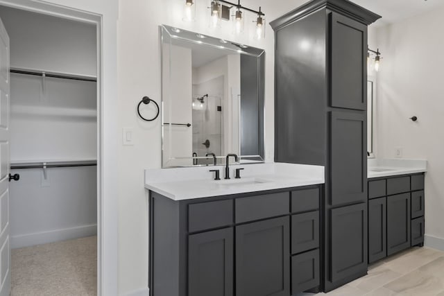 bathroom featuring vanity and walk in shower