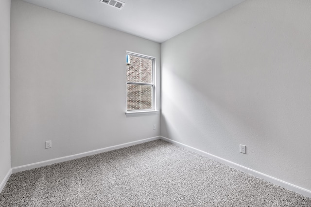 empty room featuring carpet flooring