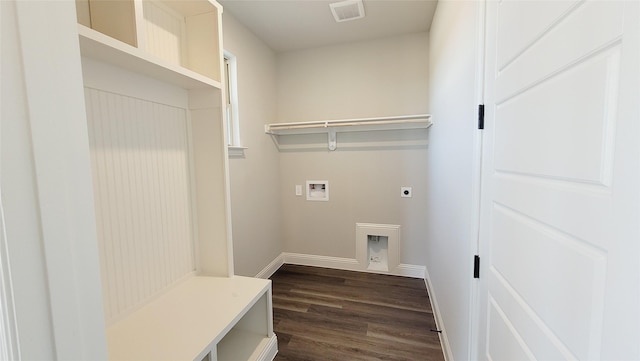 laundry area with electric dryer hookup, dark hardwood / wood-style floors, and washer hookup