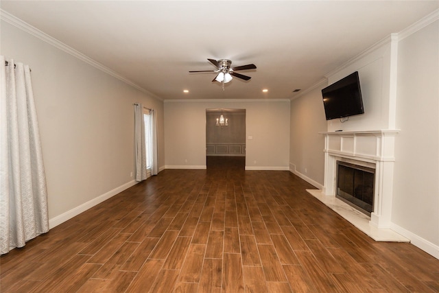 unfurnished living room featuring crown molding and ceiling fan with notable chandelier