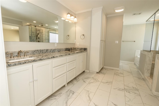 bathroom featuring ornamental molding, vanity, and shower with separate bathtub