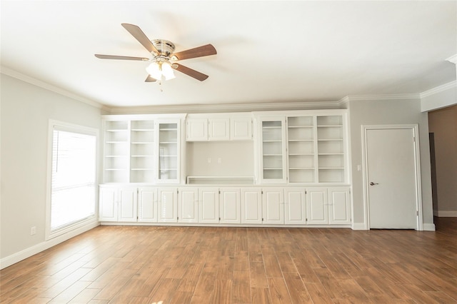 unfurnished room with crown molding, ceiling fan, and light hardwood / wood-style flooring