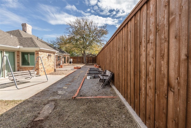 view of property exterior featuring a patio area