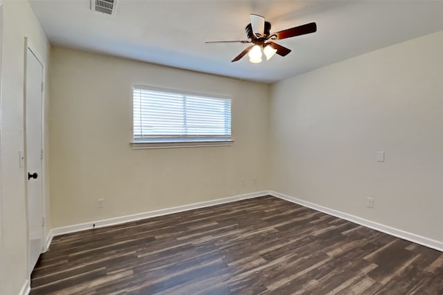 unfurnished room featuring dark hardwood / wood-style flooring and ceiling fan