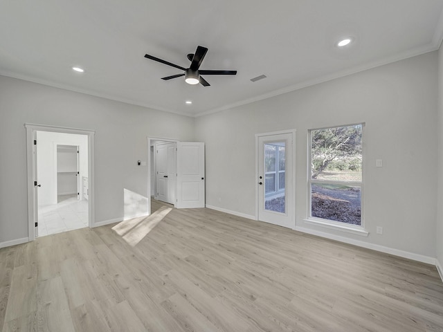 interior space with ceiling fan, ornamental molding, and light hardwood / wood-style flooring