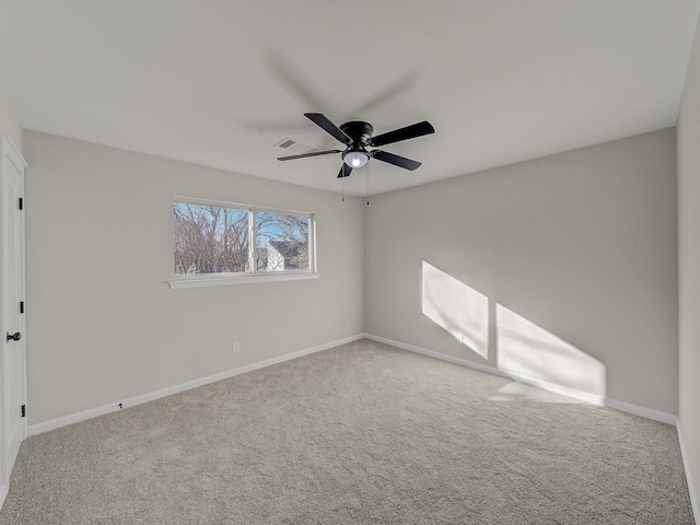 unfurnished room with carpet and ceiling fan