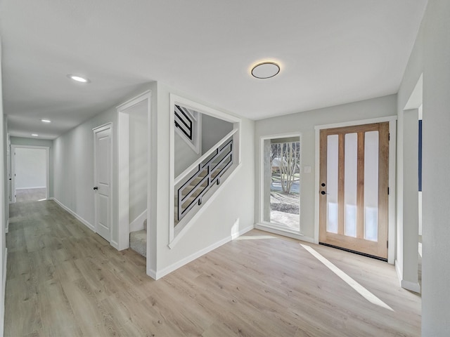 entrance foyer featuring light hardwood / wood-style floors