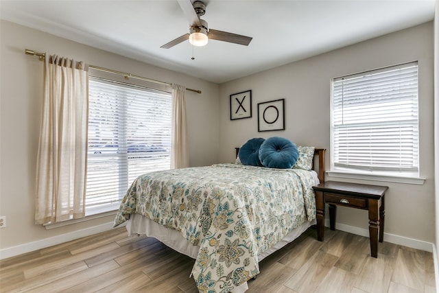 bedroom featuring ceiling fan and light hardwood / wood-style floors