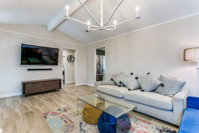 living room with an inviting chandelier, hardwood / wood-style floors, and lofted ceiling with beams