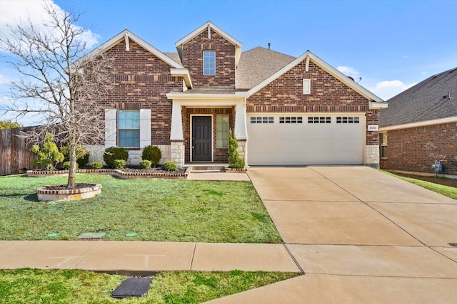 view of front facade featuring brick siding, a shingled roof, a front lawn, a garage, and driveway