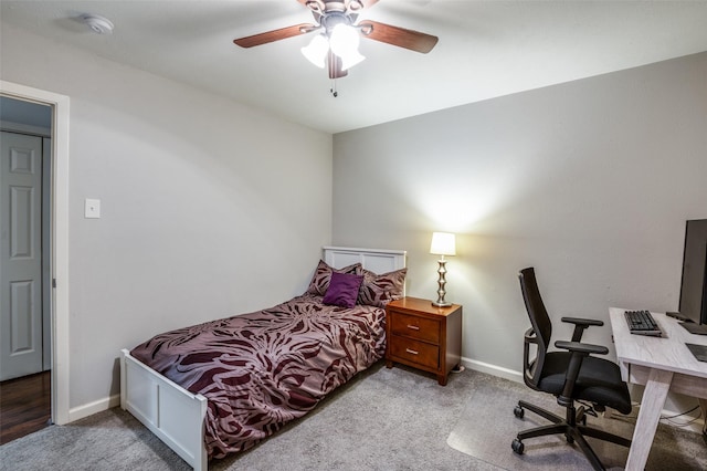 carpeted bedroom with ceiling fan