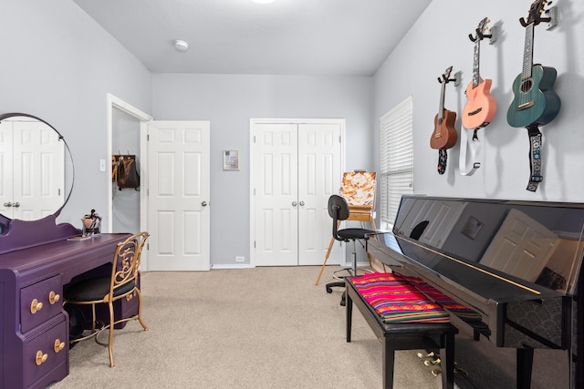 miscellaneous room featuring light carpet