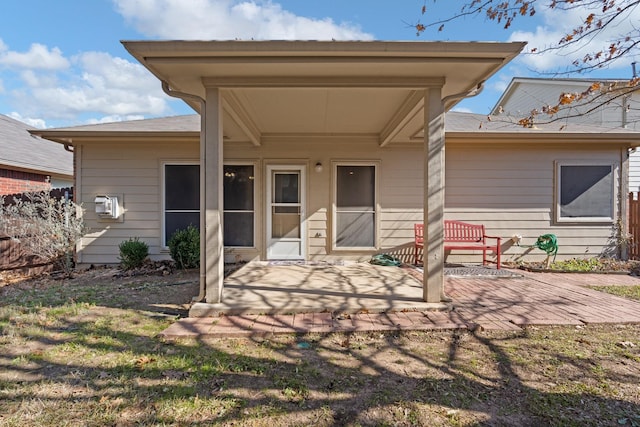 rear view of property with a patio area