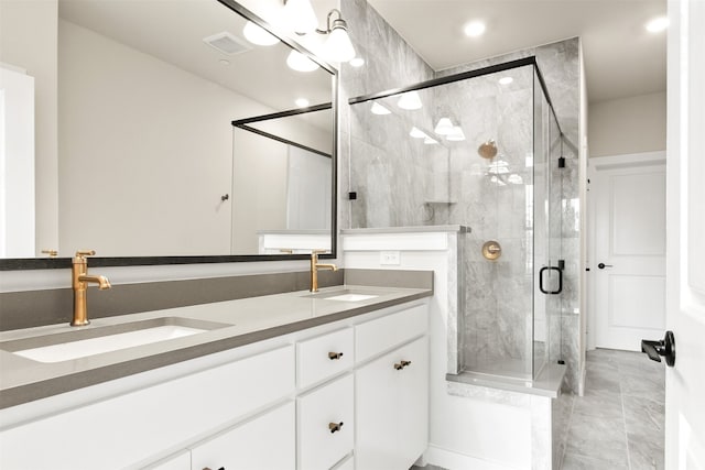 604 Tall Grass Trl, Wylie, TX 75098 - bathroom with a stall shower, double vanity, and recessed lighting