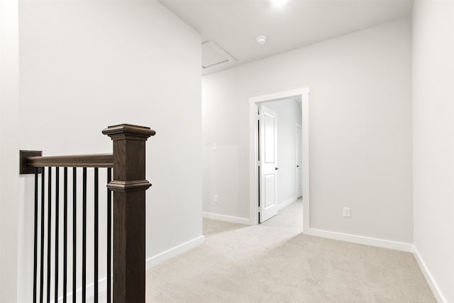 604 Tall Grass Trl, Wylie, TX 75098 - hallway featuring light carpet, baseboards, and an upstairs landing