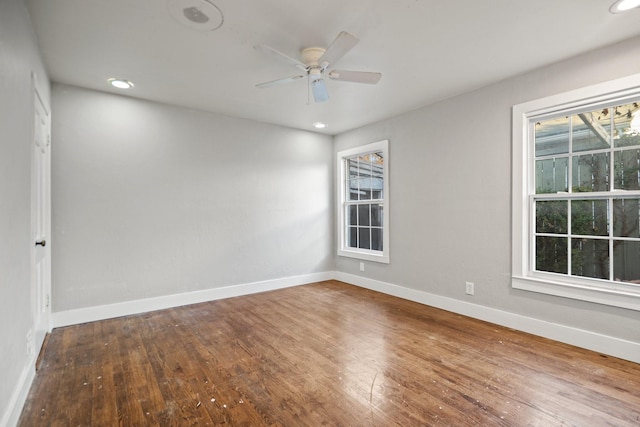 spare room featuring ceiling fan and wood-type flooring