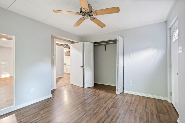 unfurnished bedroom with ceiling fan, hardwood / wood-style floors, and a closet