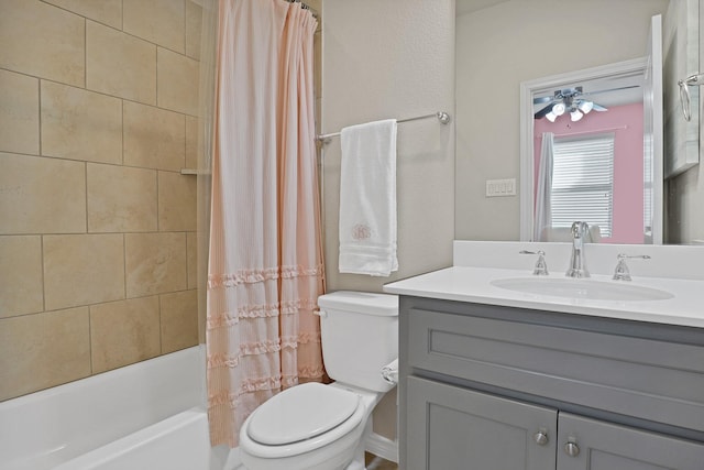 full bathroom with vanity, shower / bath combo with shower curtain, and toilet