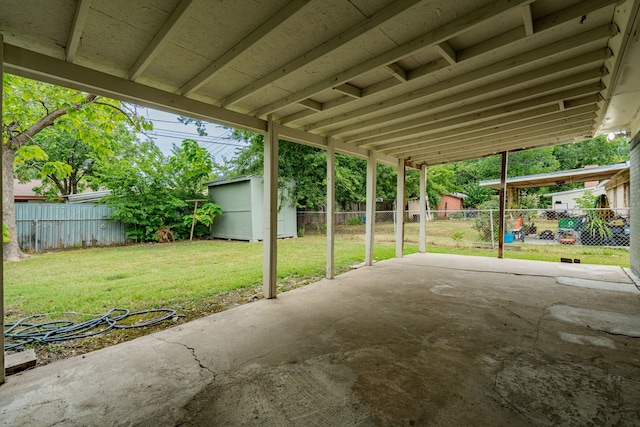 view of patio with a shed