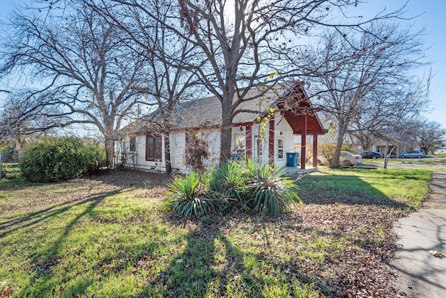 exterior space with a lawn