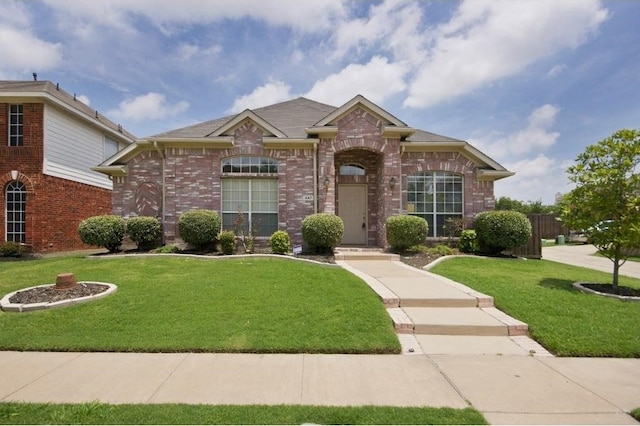 view of front of home with a front lawn