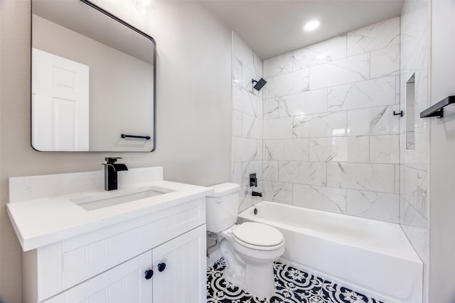 full bathroom with vanity, toilet, tiled shower / bath combo, and tile patterned flooring